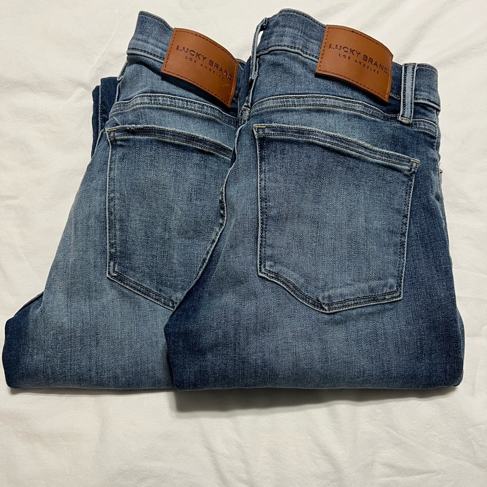 Lucky brand Mid-rise skinny Ava jeans, size 28, NWOT. Sold as a pair.